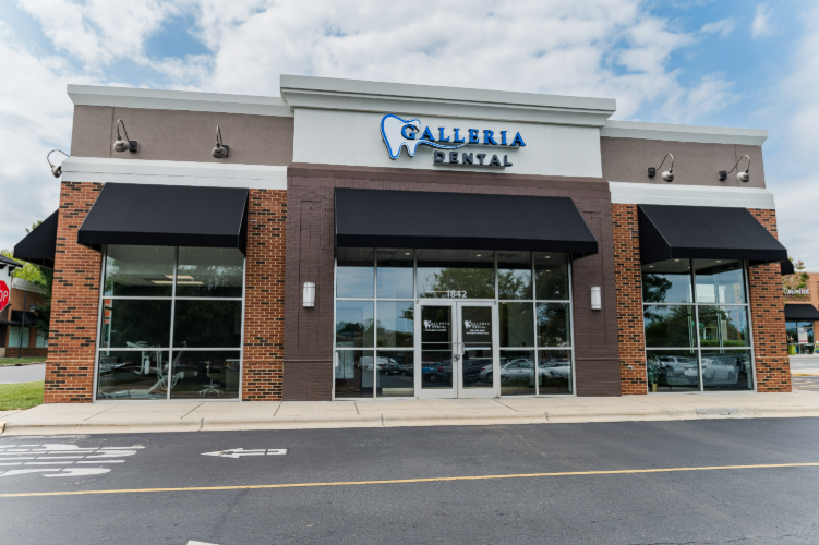 Exterior of Galleria Dental with signage and windows.