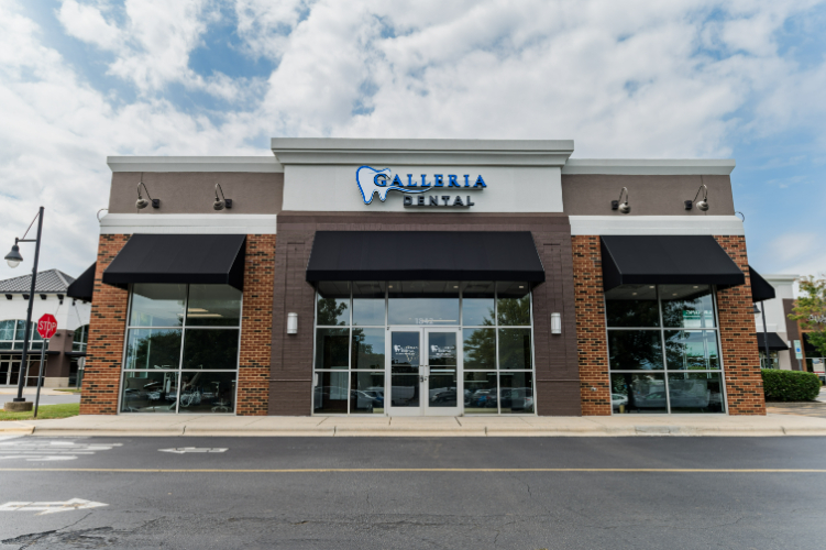 Exterior of Galleria Dental with signage and windows.