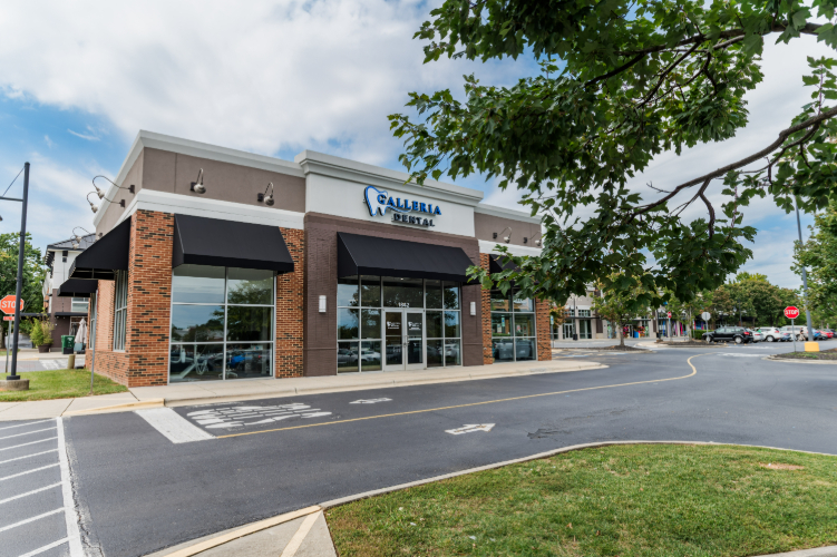 Wide-angle view of Galleria Dental exterior.