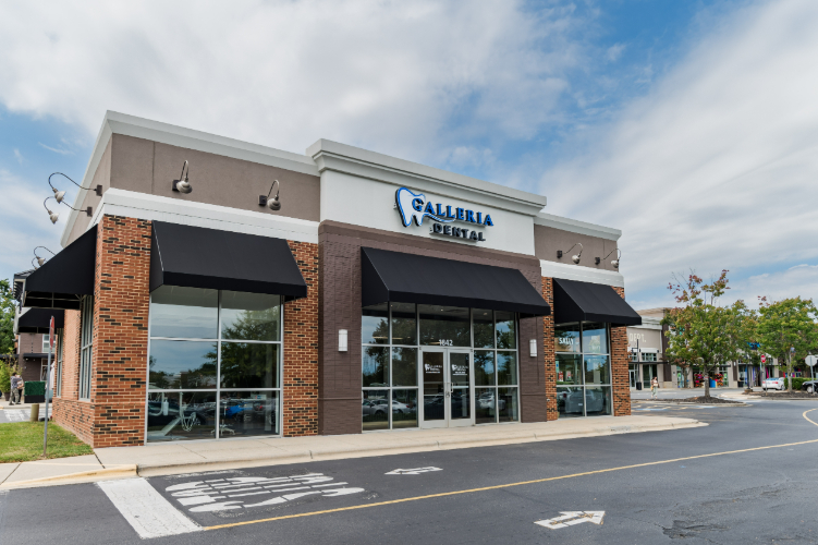 Exterior of Galleria Dental with signage and windows.